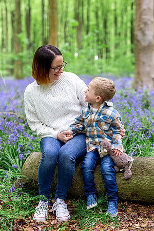 A mother and son enjoy time together in the bluebell woods