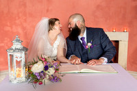 A Bride and Groom share a giggle after their wedding at Stourhead