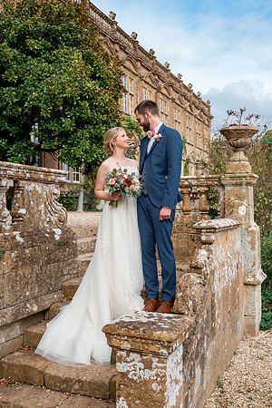 A Bride and Groom celebrate their wedding at Brympton House in Somerset