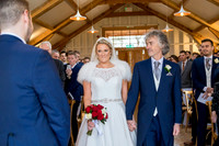 A proud father giving away his daughter at her wedding at Hyde House in the Cotswolds