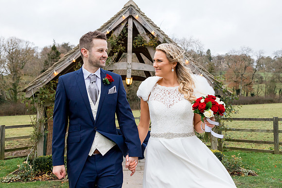 Bride and Groom celebrating their wedding at Hyde House in the Cotswolds