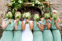 Fun wedding portrait with bride and bridesmaids